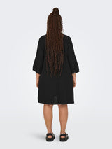 V- Neck Knie jurk Carthyra Zwart